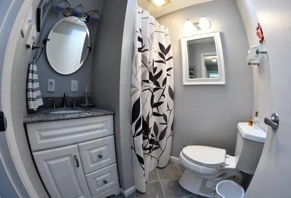 a utility room with sink dryer and washer
