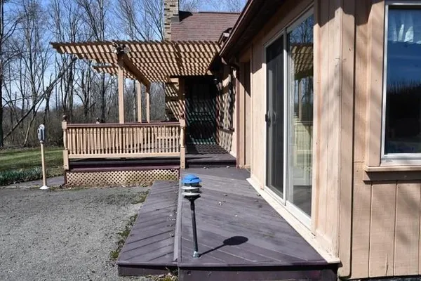 a house with trees in the background