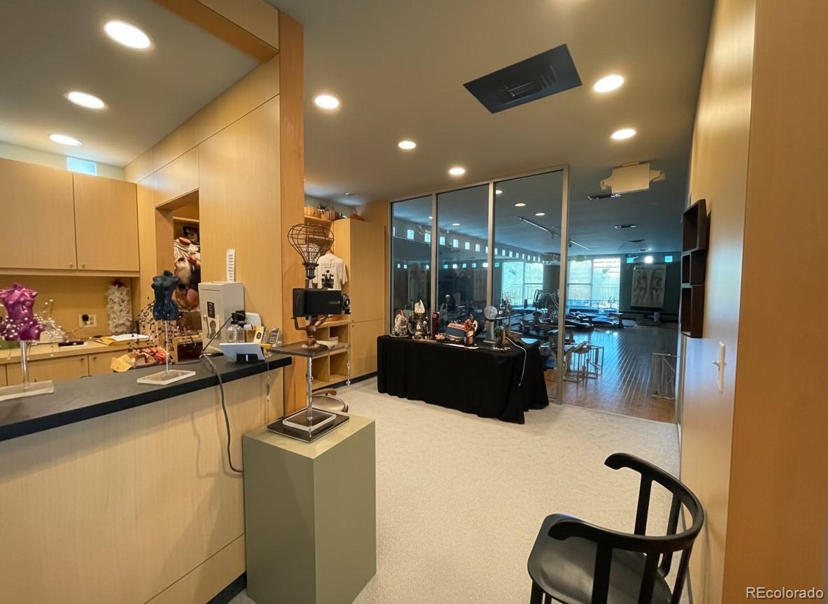536-520 Cherokee Street Denver, CO 80204 - Photo 18 of 37 a kitchen with a sink appliances and cabinets