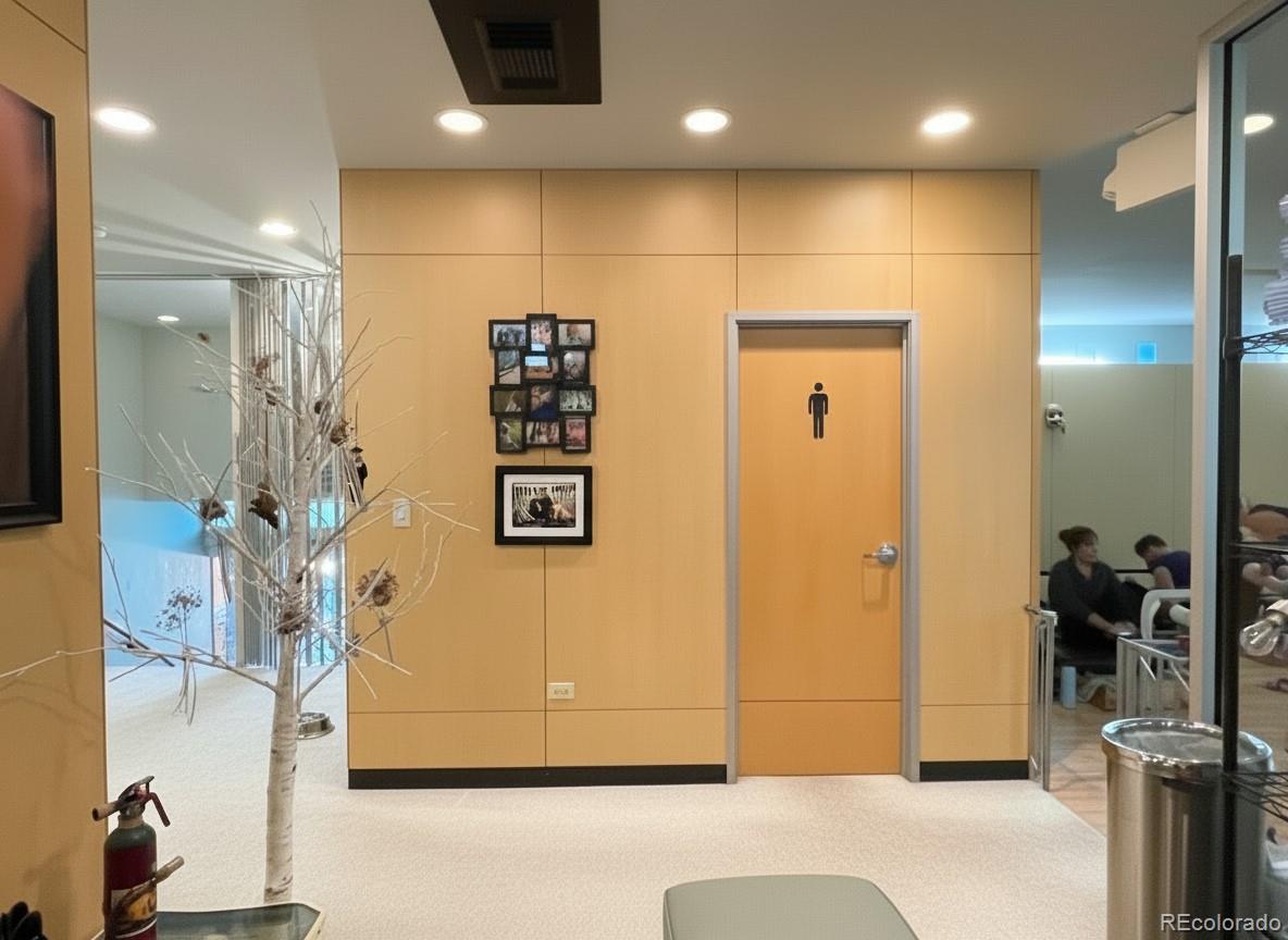 536-520 Cherokee Street Denver, CO 80204 - Photo 22 of 37 a view of a hallway with wooden shelves