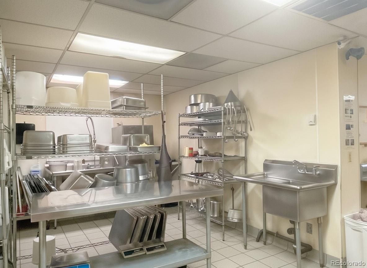 536-520 Cherokee Street Denver, CO 80204 - Photo 24 of 37 a kitchen with counter top space and appliances