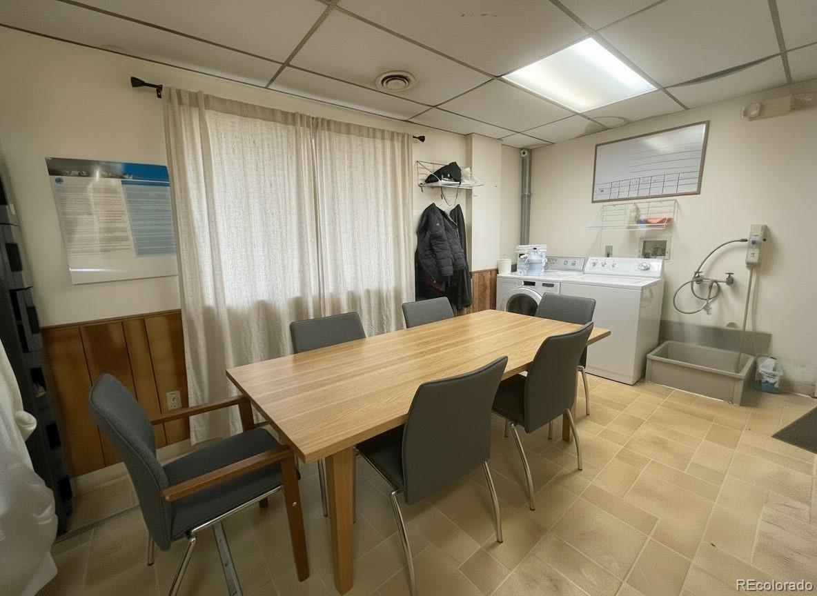 536-520 Cherokee Street Denver, CO 80204 - Photo 29 of 37 a view of a dining room with furniture and a chandelier