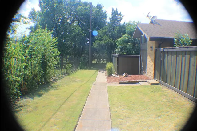 a view of swimming pool with a patio