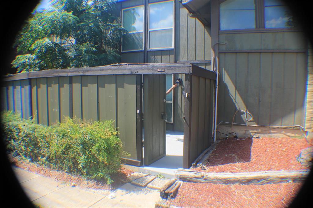 4616 Country Creek Drive, Unit 1176 Dallas, TX 75236 - Photo 17 of 19 a view of backyard with tub and entertaining space