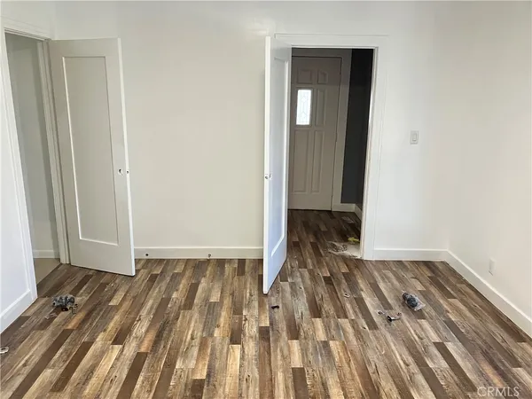 a view of a closet area with empty room