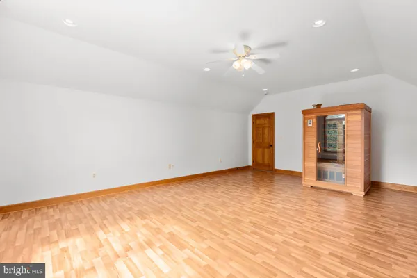 a view of an house with backyard space and garden