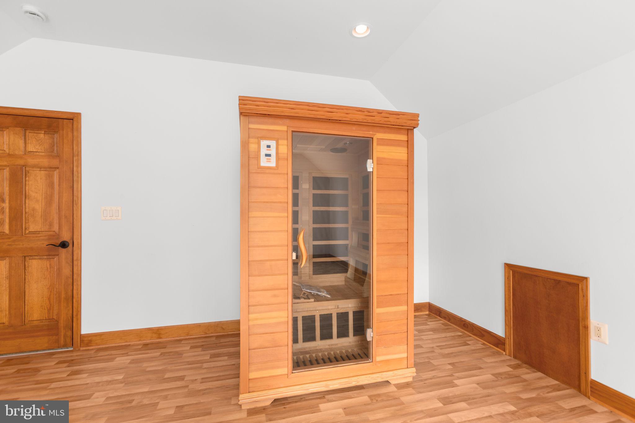 31260 Eleys Ford Road Fredericksburg, VA 22407 - Photo 49 of 108 a view of a hallway with wooden floor and staircase