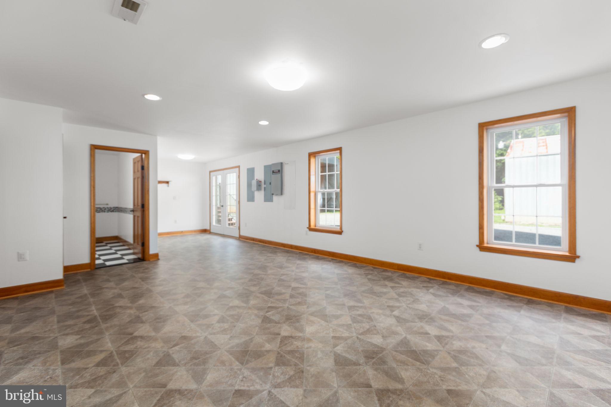 31260 Eleys Ford Road Fredericksburg, VA 22407 - Photo 54 of 108 an empty room with windows and closet