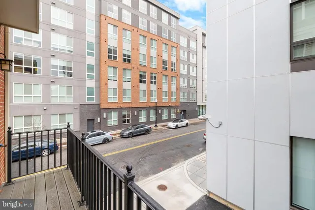 a kitchen with a stove a sink and a refrigerator