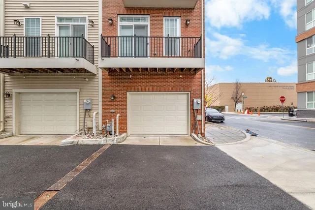 a front view of a house with a garage