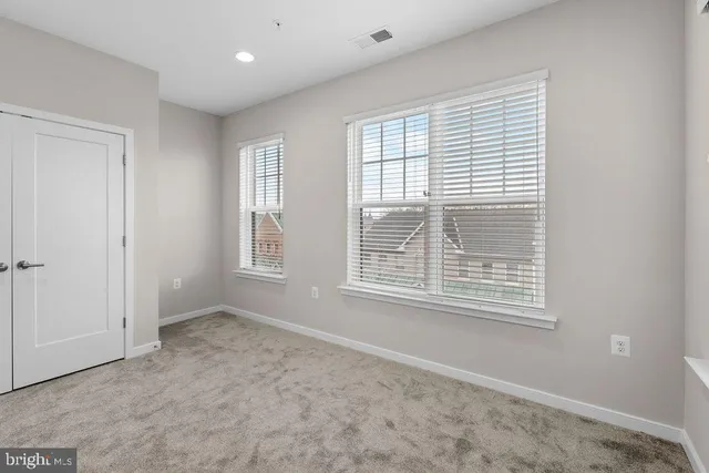 a bathroom with a sink a mirror toilet and bathtub