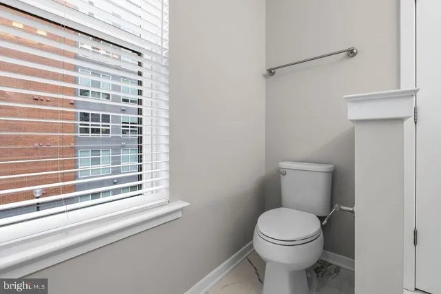 a bathroom with a double vanity sink mirror and double