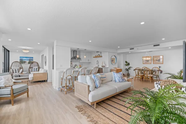 a living room with furniture and a table