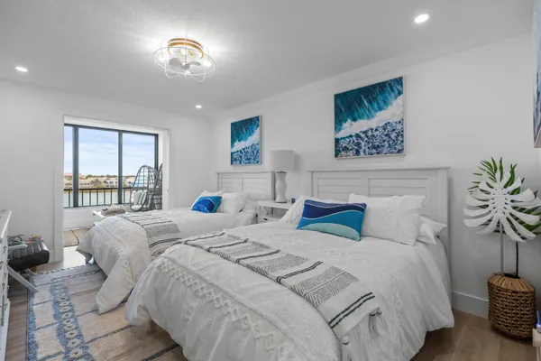 a spacious bathroom with a sink and a bathtub