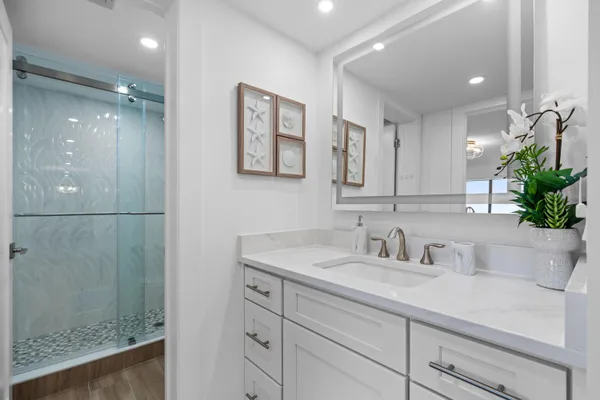 a bathroom with a shower and a toilet