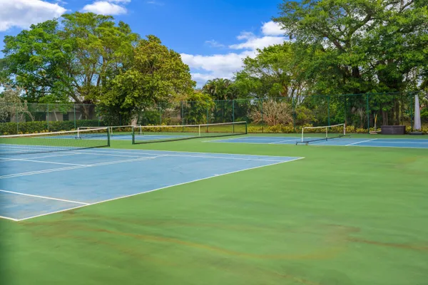 an aerial view of a house with a lake view