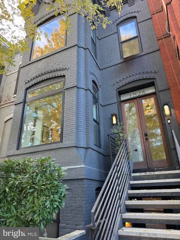a view of a back yard from a patio