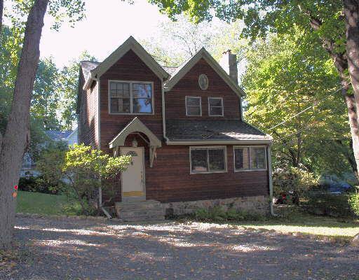 14 Clearview Drive Ridgefield, CT 06877 - Photo 1 of 1 a front view of a house with a yard and garage