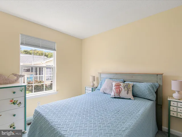 a bathroom with a sink toilet and vanity
