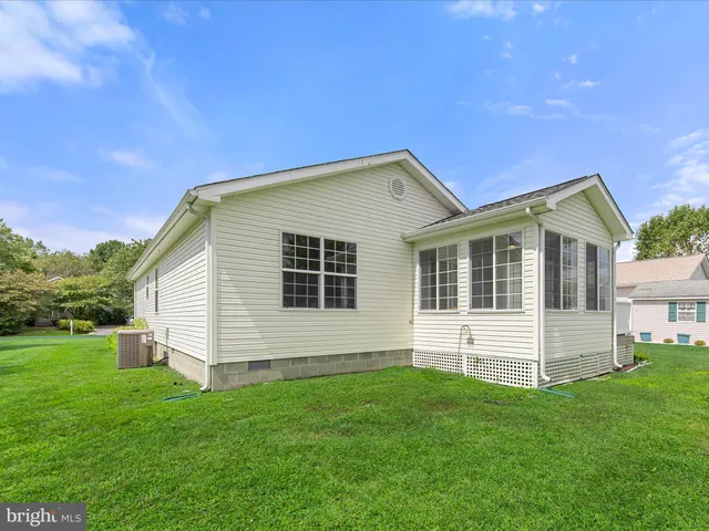 a view of swimming pool with a yard