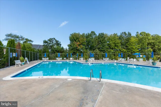 a view of a golf course with a lake view