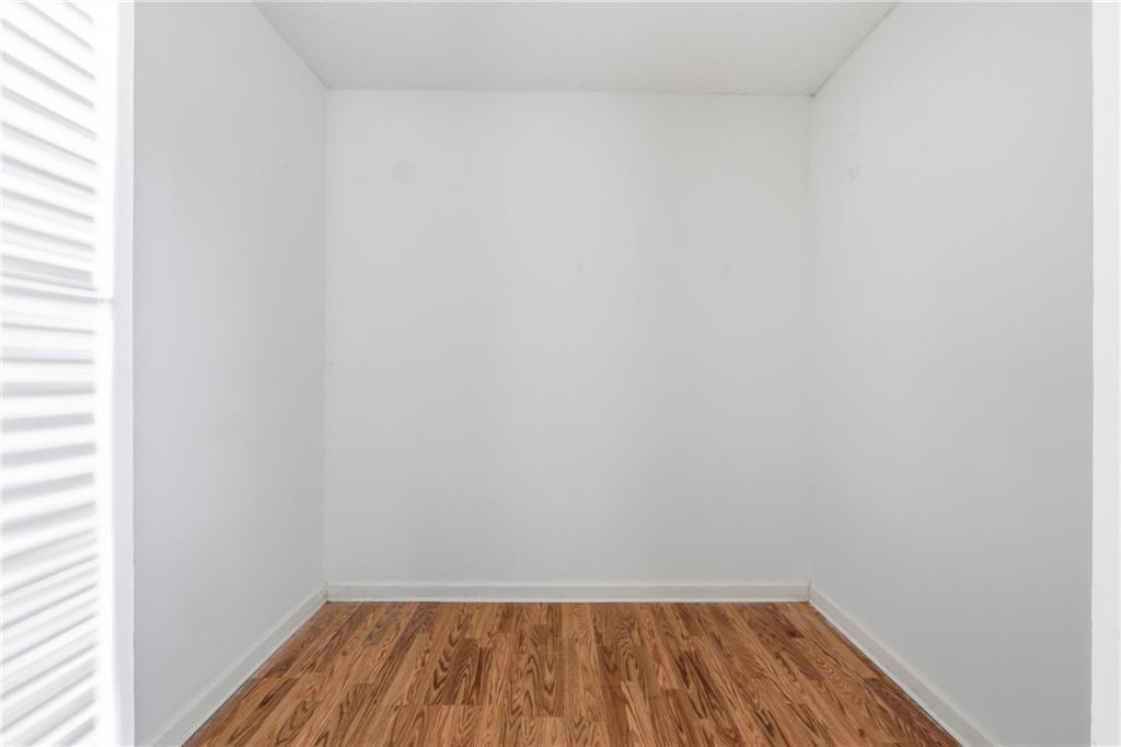 4828 Oak Path Stone Mountain, GA 30088 - Photo 26 of 40 a view of a room with wooden floor and small space