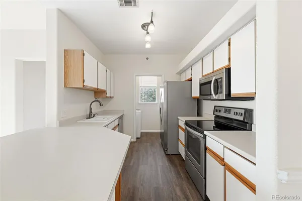 $308,000 | 6017 Castlegate Drive West, Unit F25, Castle Rock, CO 80108