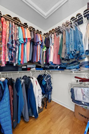 an aerial view of residential houses with outdoor space and street view