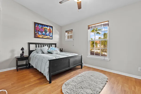 an aerial view of house with yard swimming pool and outdoor seating