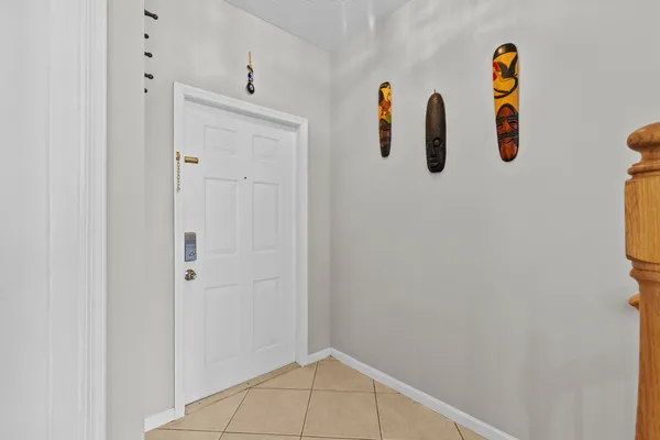 a kitchen with stainless steel appliances granite countertop a sink refrigerator and a stove