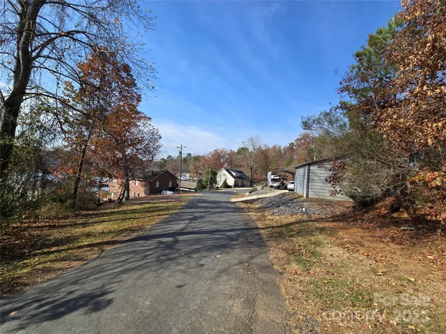 a view of a lake with a large trees