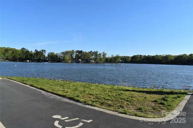 a view of outdoor space with signage and flags