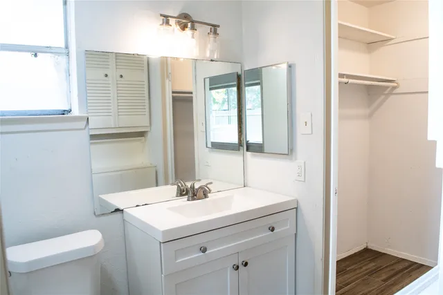 a view of a hallway with a chandelier