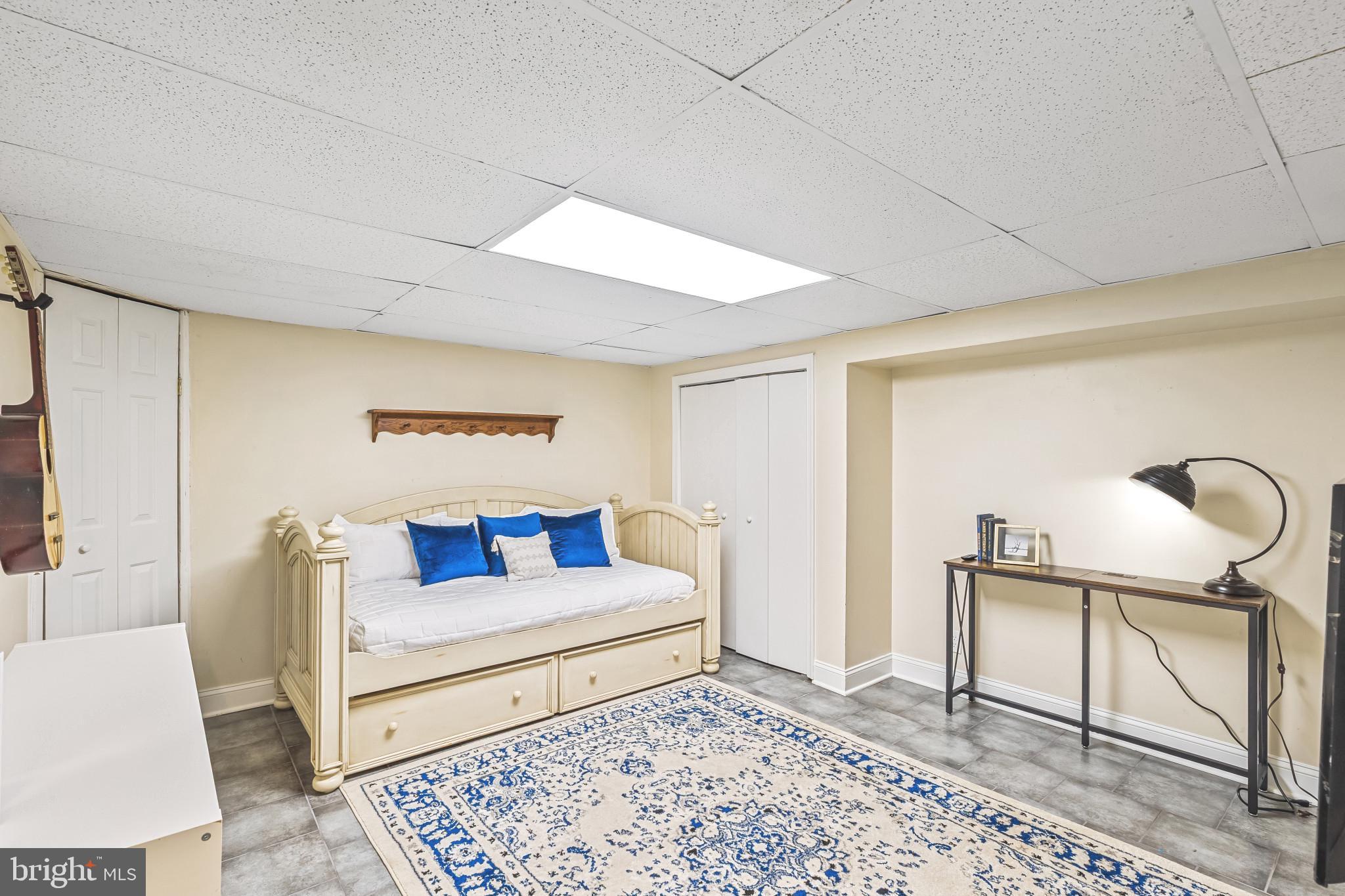 8362 Oakleigh Road Parkville, MD 21234 - Photo 19 of 28 a living room with furniture and a rug