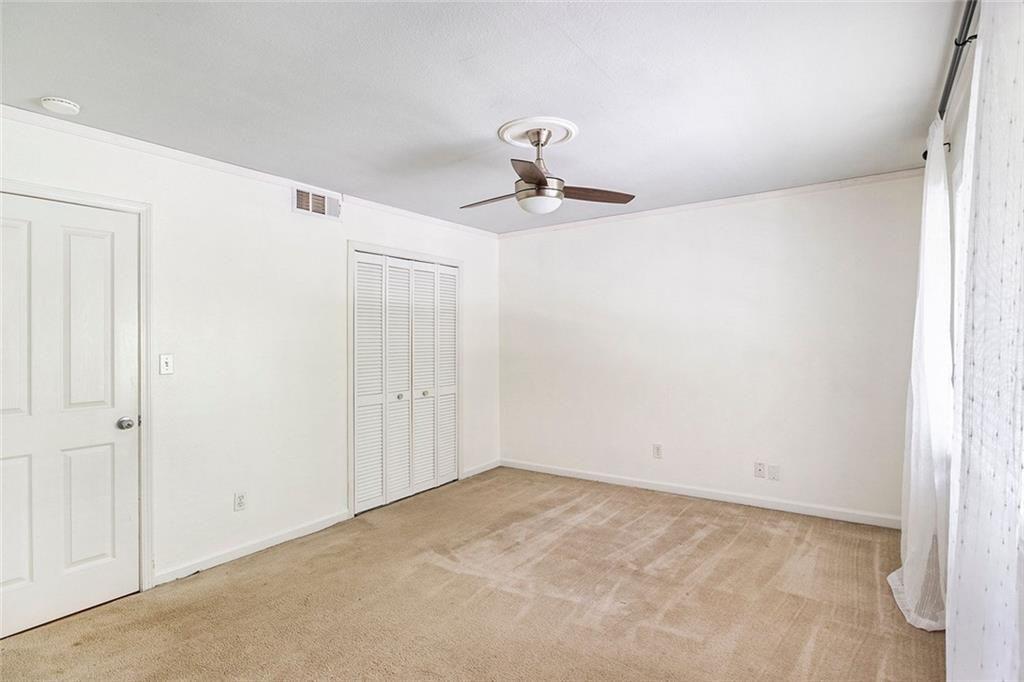 6940 Roswell Road, Unit 16B Atlanta, GA 30328 - Photo 21 of 27 a view of an empty room