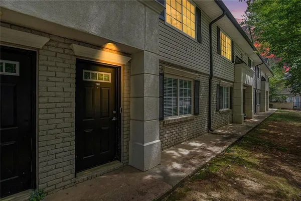 a view of a brick house with a large door