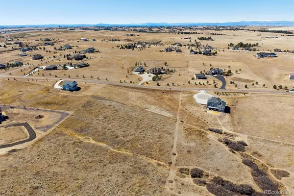 an aerial view of beach with ocean view