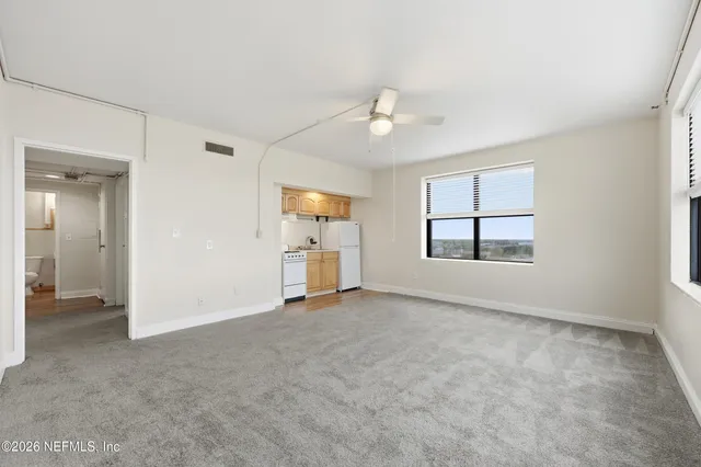 a view of a storage & utility room with washer and dryer