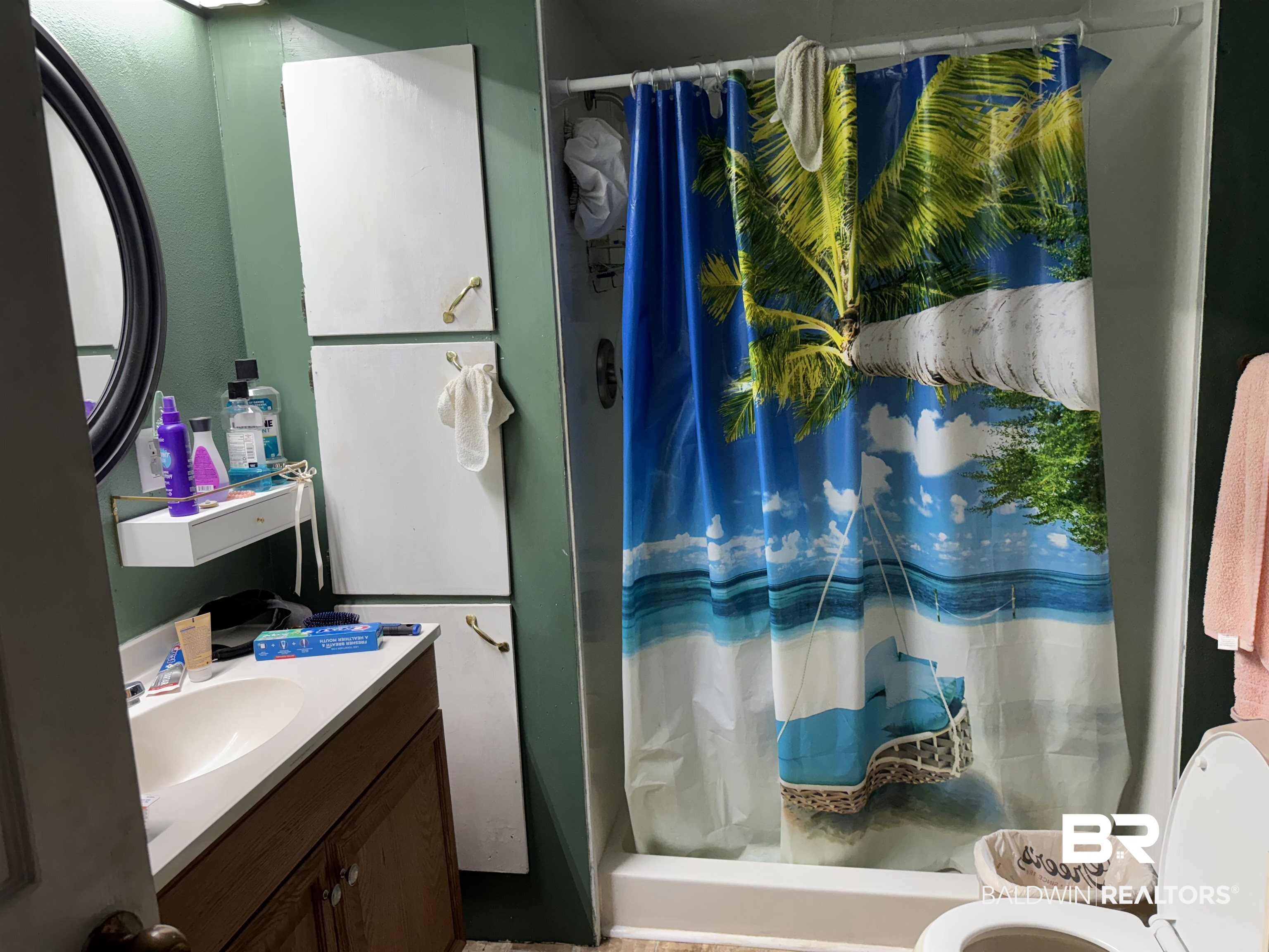15760 Pine Grove Rd Extension West Bay Minette, AL 36507 - Photo 11 of 22 Full bath featuring toilet, vanity, and curtained shower