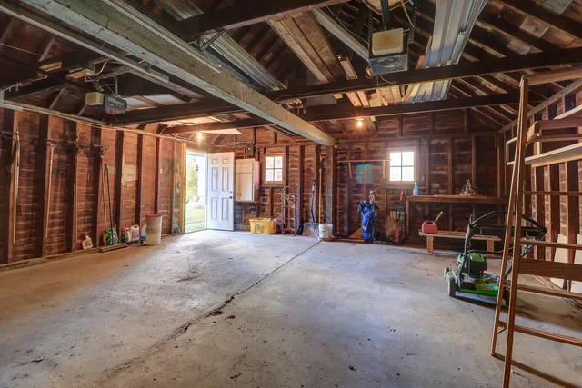 a view of an empty room with windows