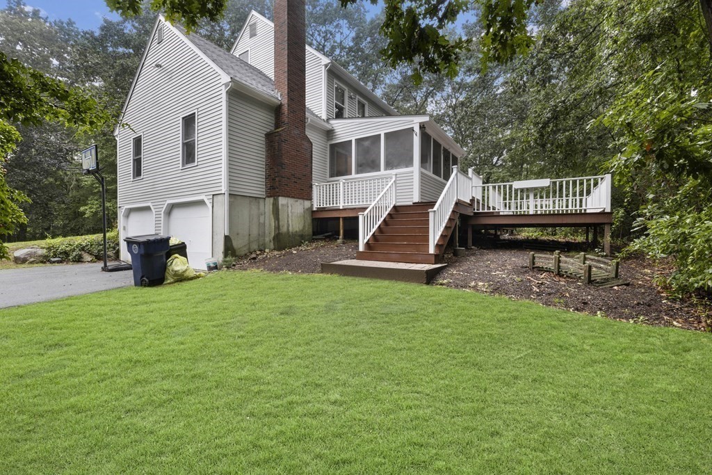 3 Daniels Road Medway, MA 02053 - Photo 3 of 28 a view of a house with backyard and sitting area