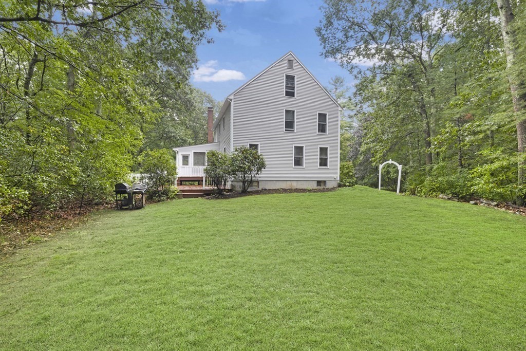3 Daniels Road Medway, MA 02053 - Photo 4 of 28 a front view of a house with garden