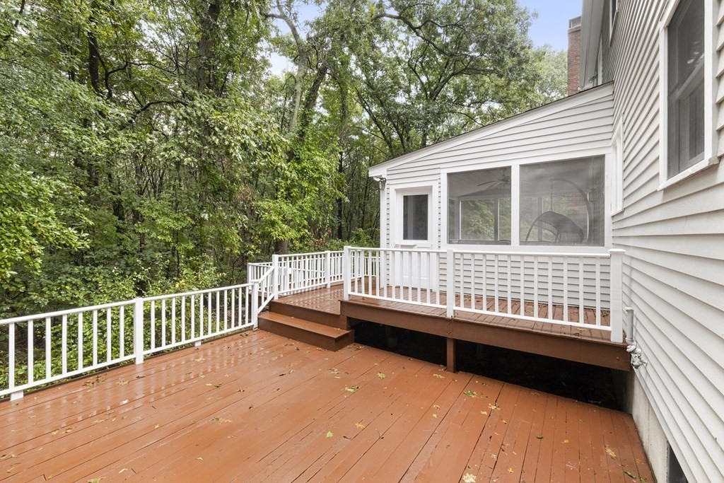 3 Daniels Road Medway, MA 02053 - Photo 7 of 28 a view of a deck with a white roof and wooden fence