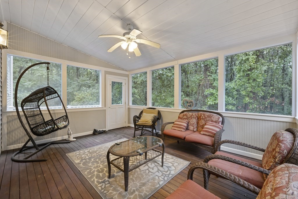 3 Daniels Road Medway, MA 02053 - Photo 8 of 28 a living room with furniture and a floor to ceiling window