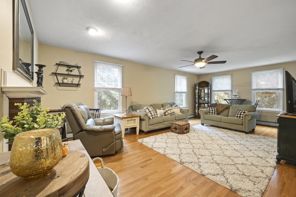 3 Daniels Road Medway, MA 02053 - Photo 10 of 28 a living room with furniture and a large window