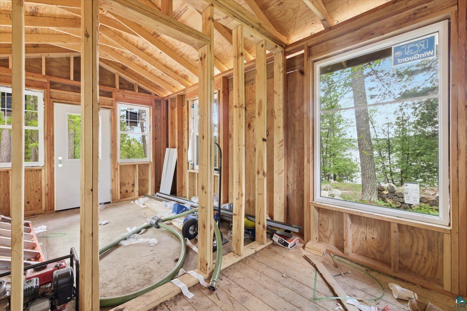 5298 Long Island Tower, MN 55790 - Photo 27 of 31 Framed interior featuring wood stud construction and visible roof trusses