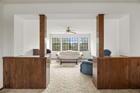 wooden floor in an empty room and a window