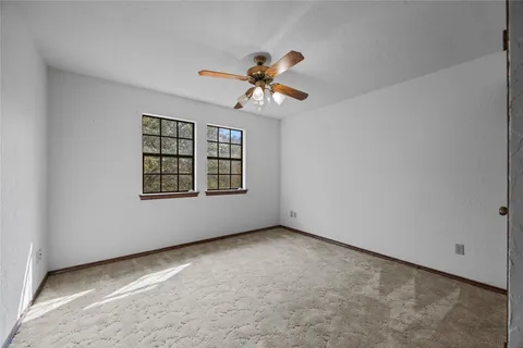 a view of a livingroom with furniture and front door