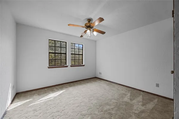 a view of a livingroom with furniture and front door