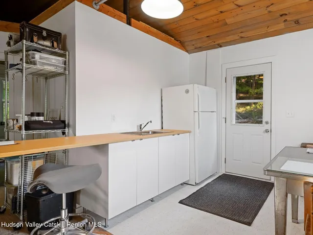 a view of a kitchen with a sink